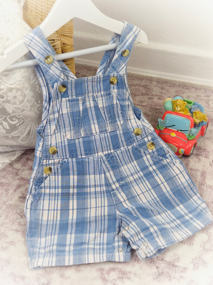 9-12 months. Blue and white checked vintage short dungarees