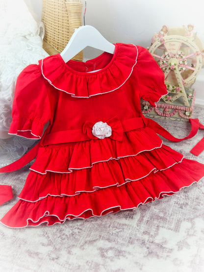 18 months. Red layered vintage dress with ruffle collar, puff sleeves and white flower centre