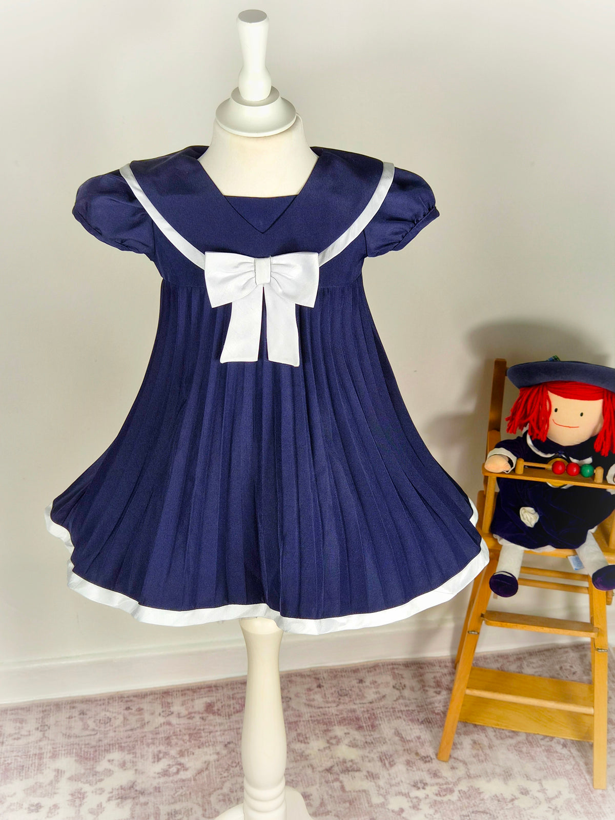 12-18 months. Navy vintage sailor style dress with pleats, puff sleeves and white bow. Maxi style*