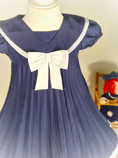 12-18 months. Navy vintage sailor style dress with pleats, puff sleeves and white bow. Maxi style*