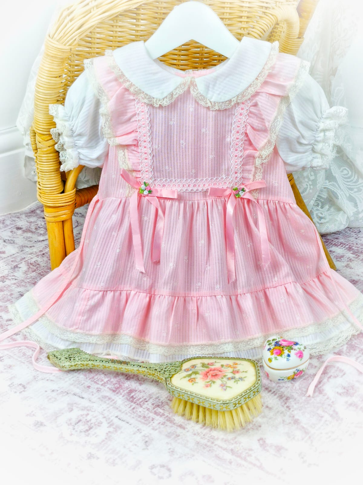 12-18 months. Pink and white vintage dress from Toddle Time, flutter shoulders, puff sleeves, lace and ribbon