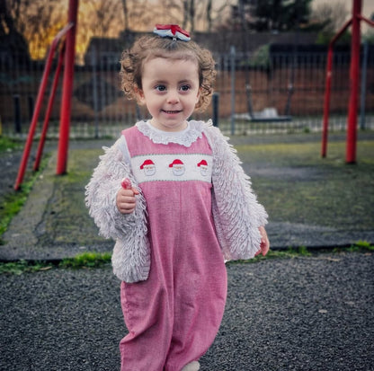18 months. Red and white gingham romper with white smocking and embroidered Santa faces