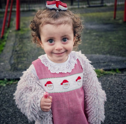 18 months. Red and white gingham romper with white smocking and embroidered Santa faces