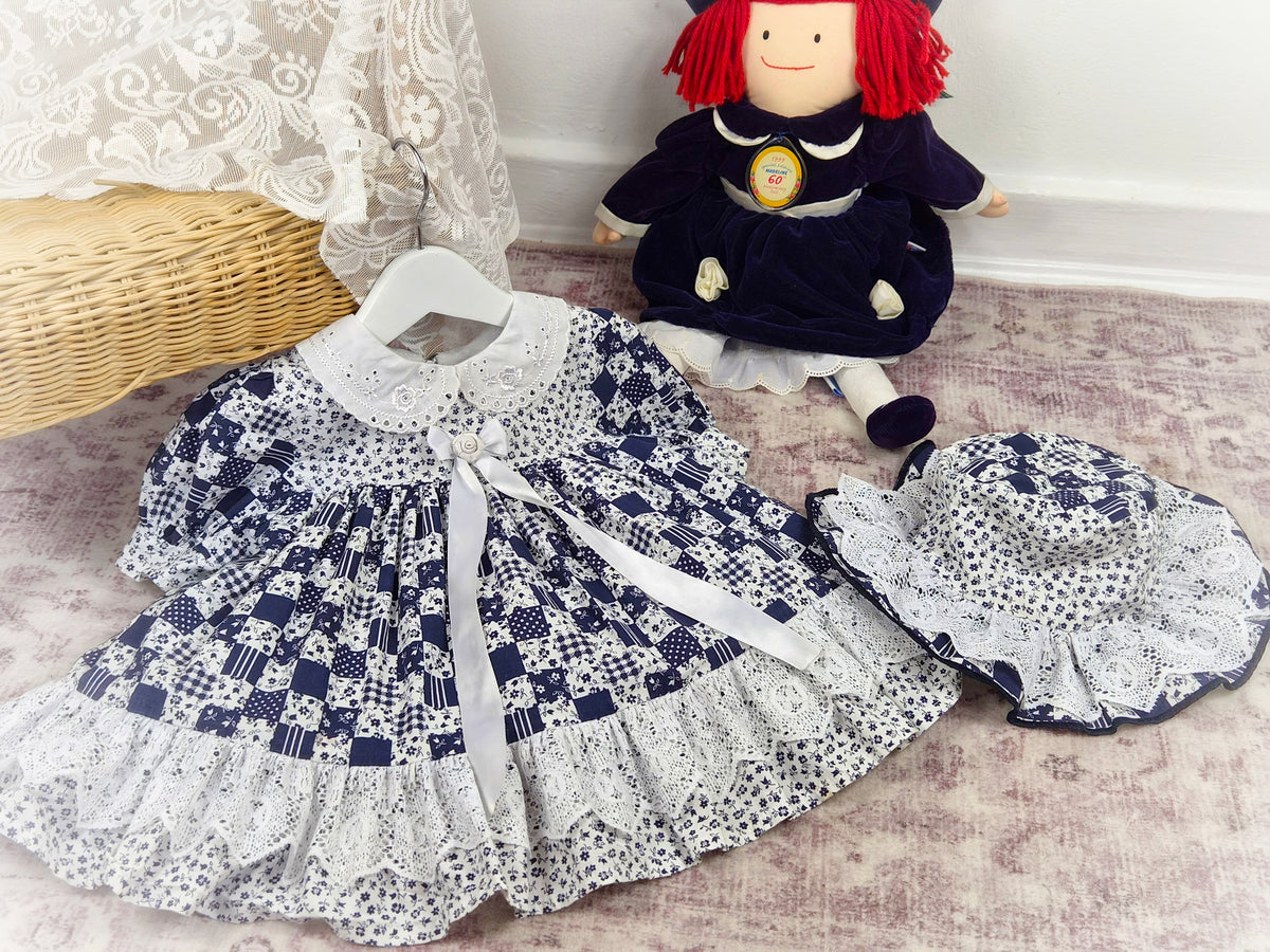 2 years. Navy and white vintage dress with eyelet collar and hem and matching hat