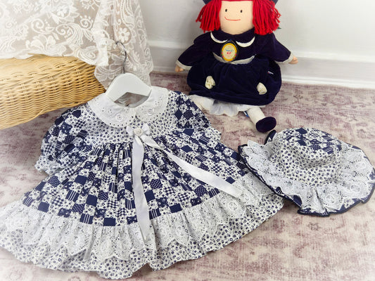 2 years. Navy and white vintage dress with eyelet collar and hem and matching hat
