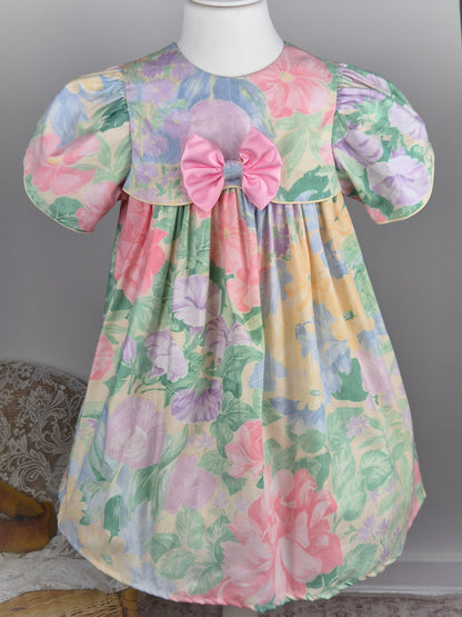 5 years. Pastel floral vintage dress with pink satin bow