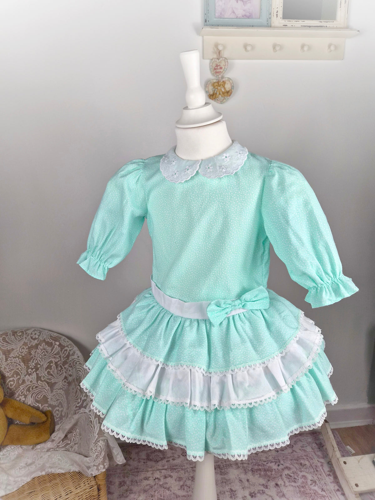 3 years. Mint and white vintage dress with tiered skirt and light floral print