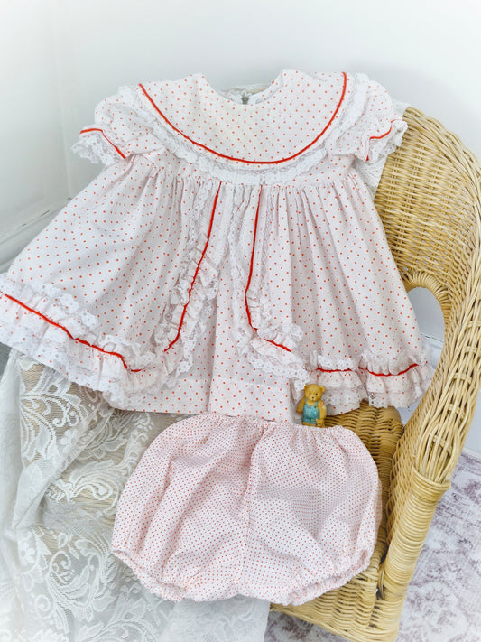 18-24 months. White dress with red polka dot and lace trim. Matching bloomers