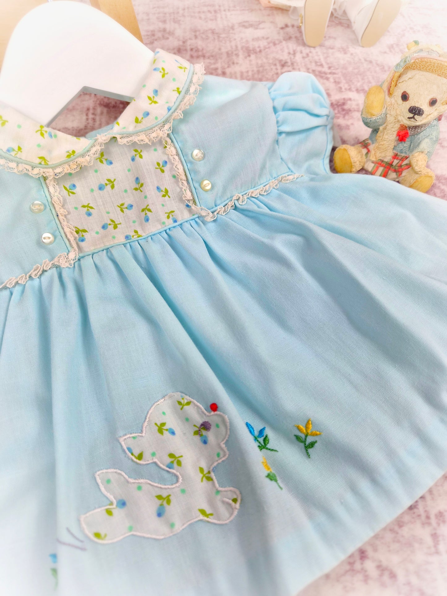 0-6 months. Blue vintage dress with lamb & flowers, puff sleeves and sweet collar