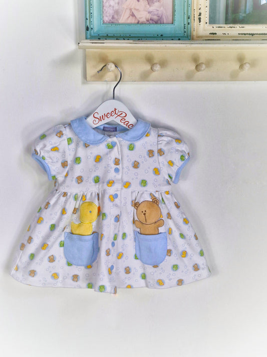 9-12 months. White vintage Carters dress with blue collar and pockets, bears, frogs and ducks print