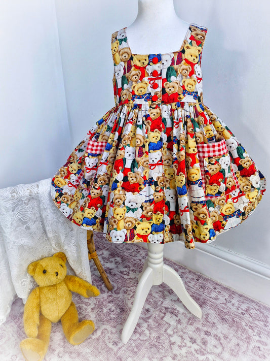 5 years. Handmade teddy print sleeveless dress with gingham details and red buttons