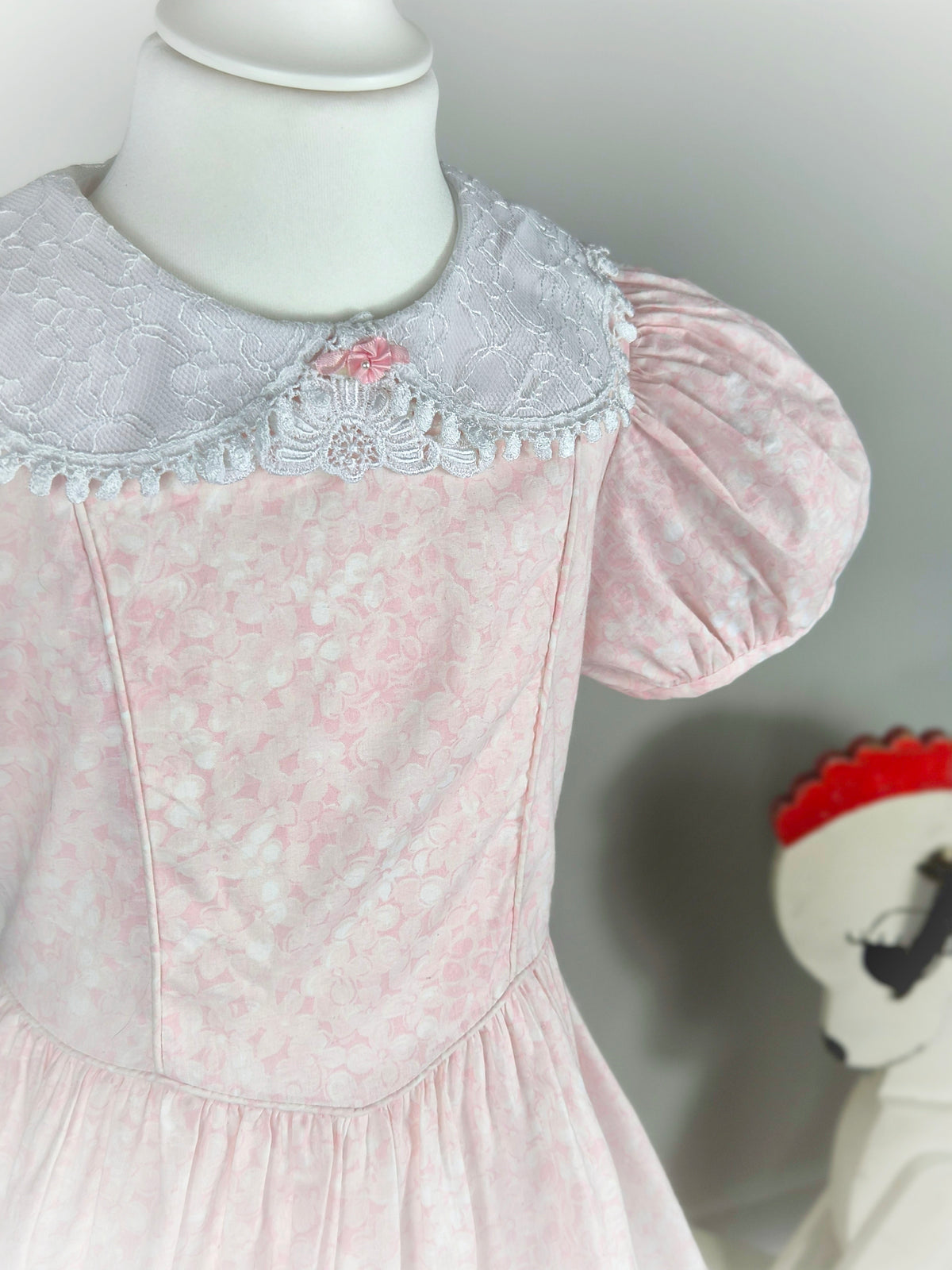 6 years. Pink vintage floral dress from Rare Editions with puff sleeves, white lace collar and hem