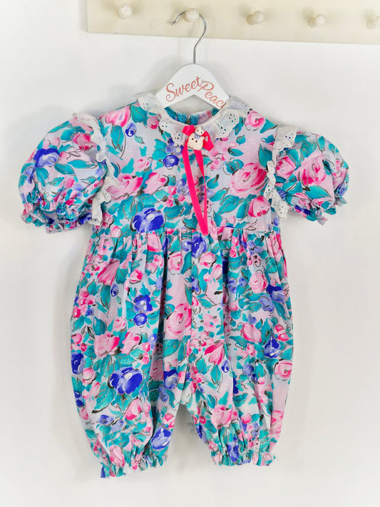 18-24 months. Floral romper with porcelain cat and pink ribbon