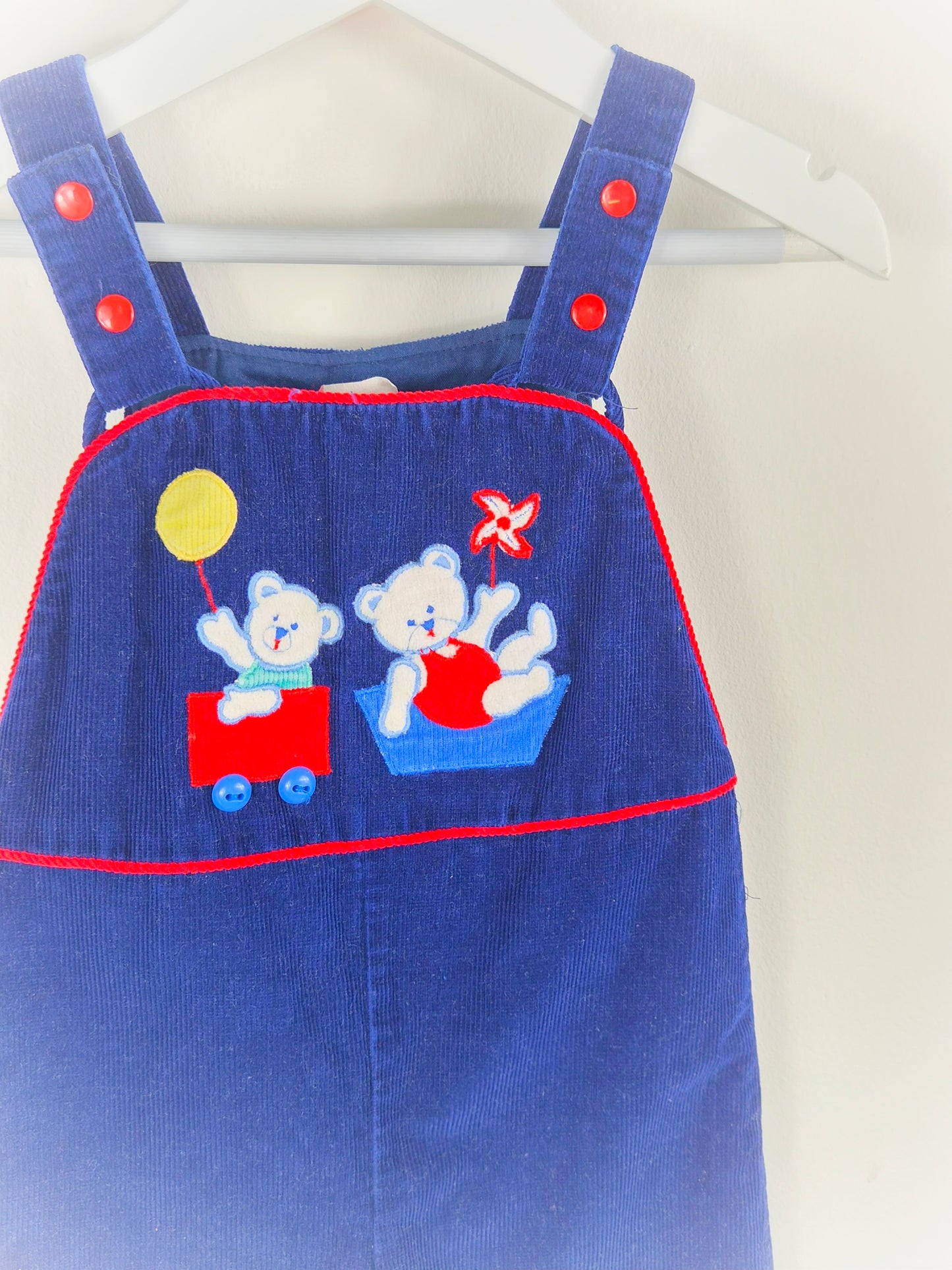 18-24 months. Navy corduroy dungarees with teddies appliques