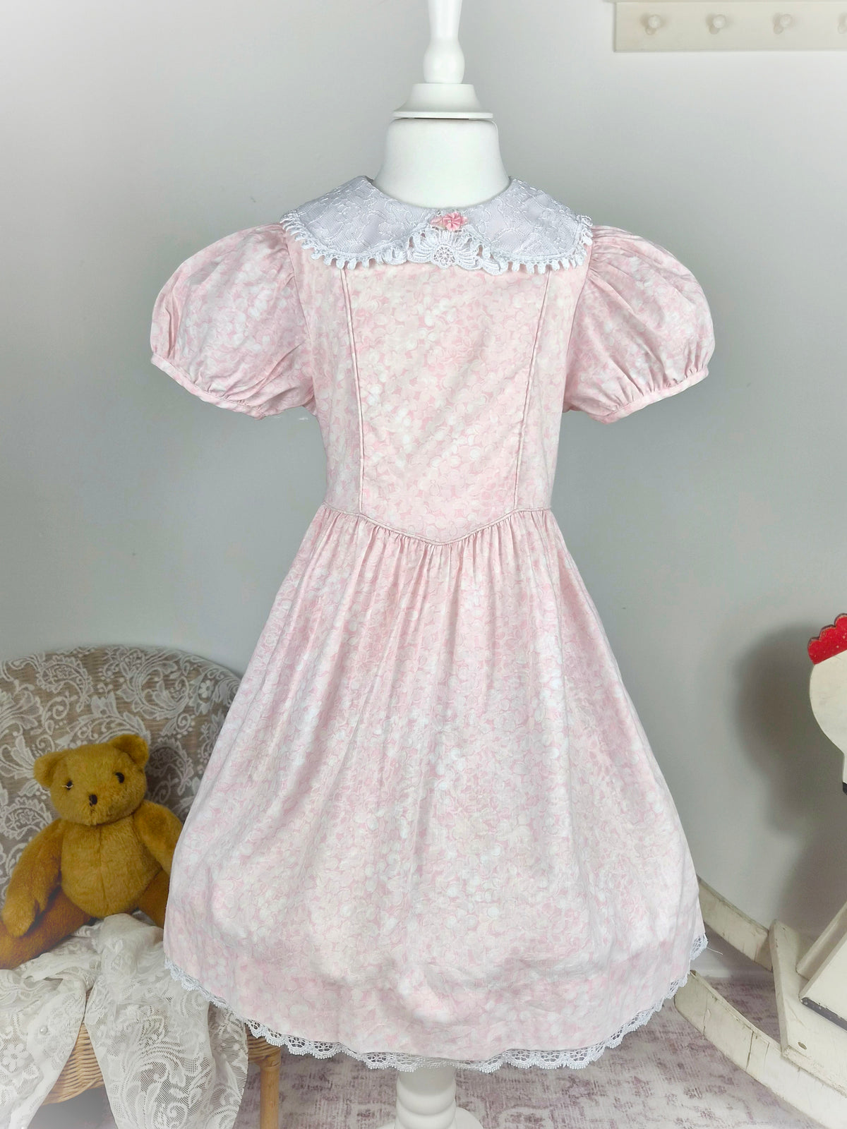 6 years. Pink vintage floral dress from Rare Editions with puff sleeves, white lace collar and hem