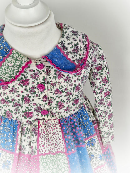 2-3 years. Floral dress, made in USA.