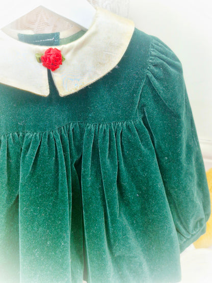 12-18 months. Vintage forest green velvet dress by Jolene, with cream satin collar, cream lace and red floral centre