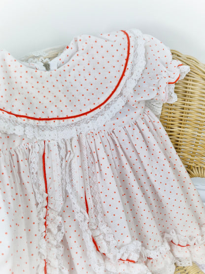 18-24 months. White dress with red polka dot and lace trim. Matching bloomers