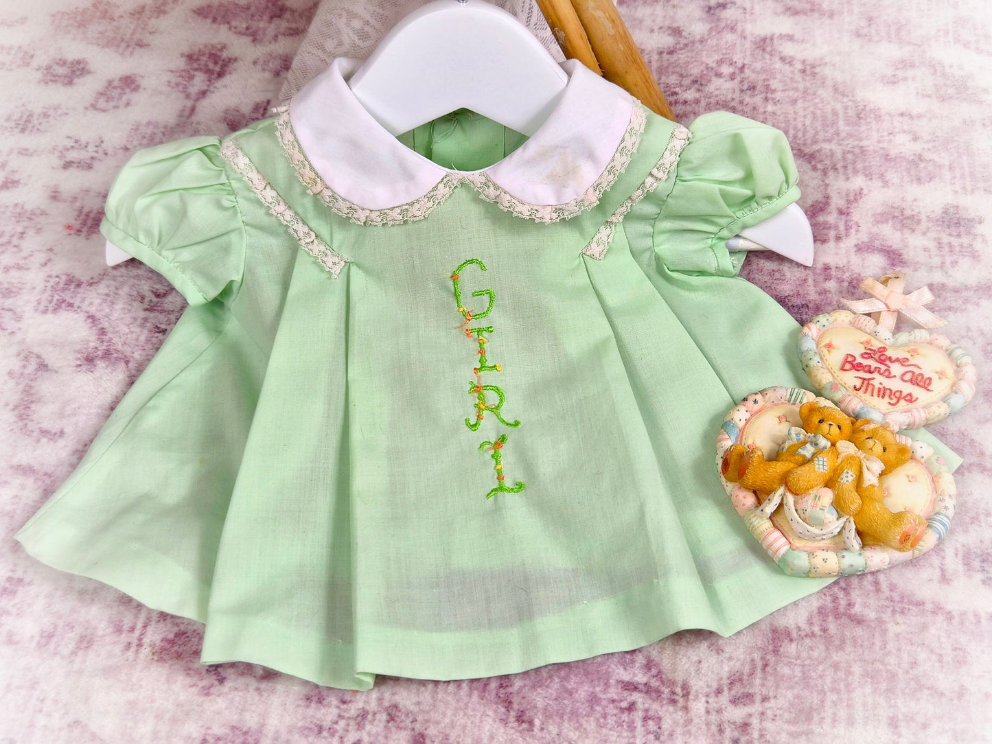 0-3 months. Mint vintage dress with puff sleeves, white collar and embroidered "Girl"
