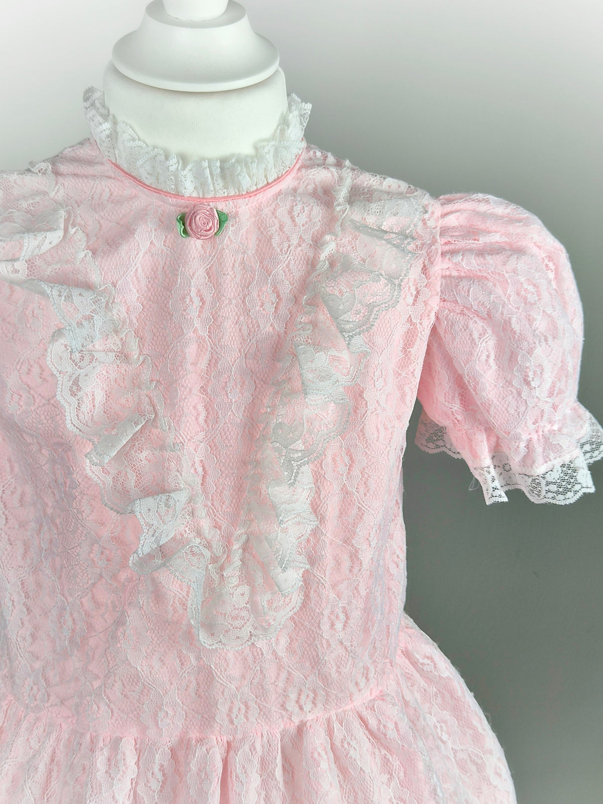 3-4 years. Pink vintage Cradle Togs with white lace overlay, puff sleeves and ruffles