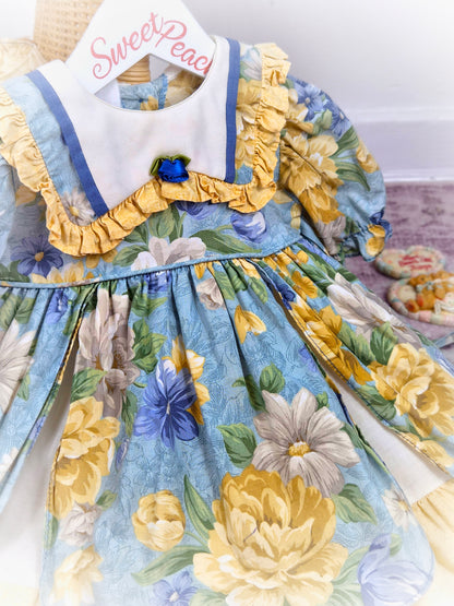 18-24 months. Yellow and blue floral vintage dress. Small fault*