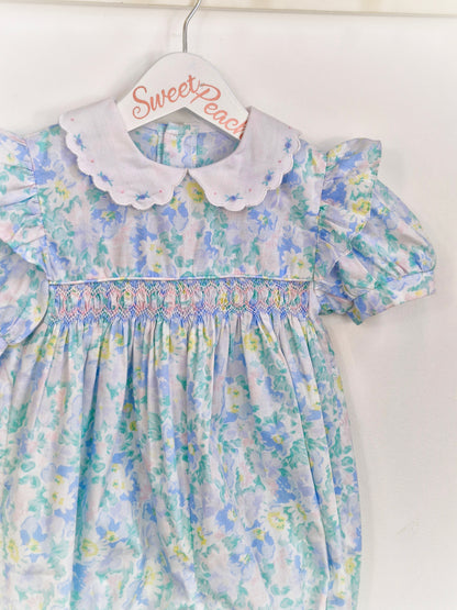 12-18 months. Blue, floral, smocked romper with white, embroidered collar