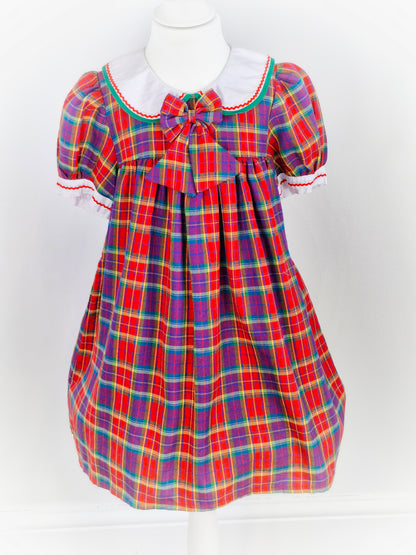 5-6 years. Pretty checked dress with collar and bow