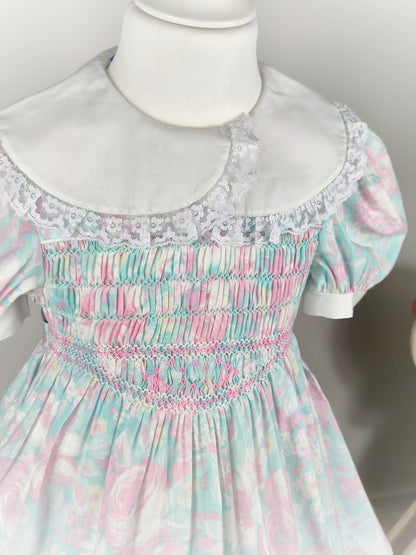3-4 years. Pink and blue pastel smock vintage dress with puff sleeves, white collar and lace trim