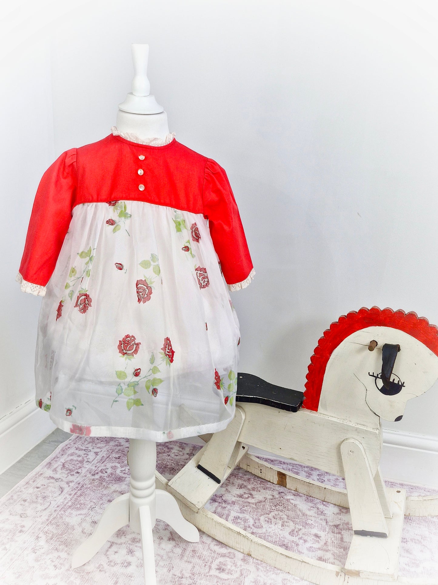 3 years. Red and white dress with flower print.