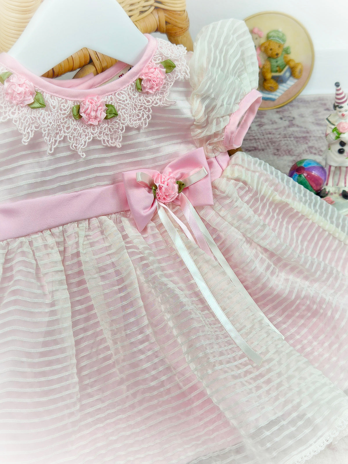 9-12 months. Pink striped vintage taffeta dress with lace collar, pink flowers and belt.