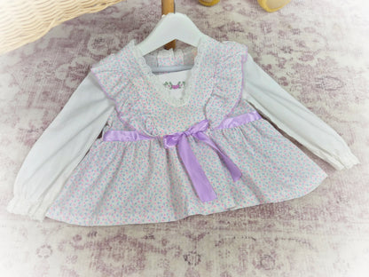 2 years. White vintage long sleeve blouse with lilac ribbon, frills and floral print