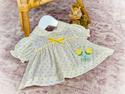 0-3 months. Vintage dress with lemon floral print, yellow ribbon and embroidered flowers
