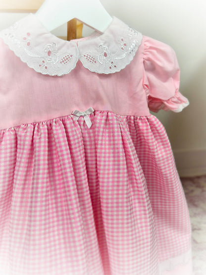 12 months. Pink and white gingham vintage dress with white collar and puff sleeves