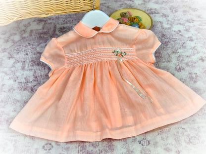 6-9 months. Peach vintage smock dress