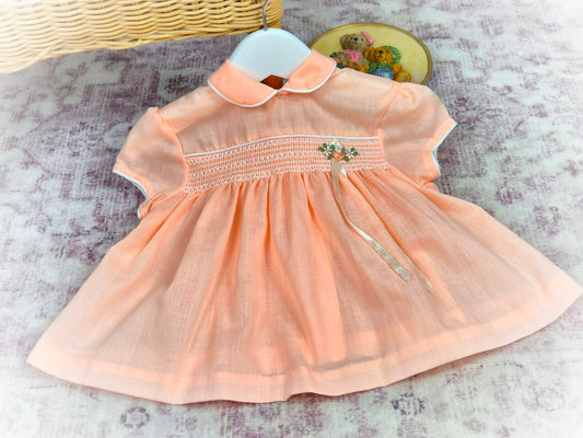 6-9 months. Peach vintage smock dress