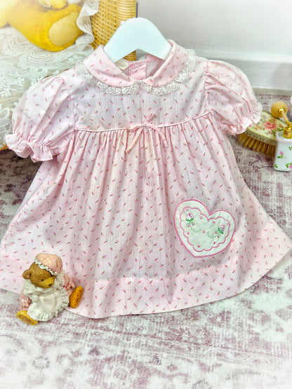 12 months. Pink vintage dress with tiny flowers and heart applique