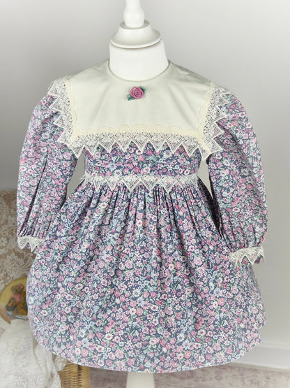 2-3 years. Floral vintage dress with white bib and lace details