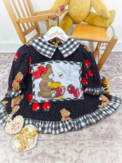 2-3 years. Black vintage top with gingham collar and hem, polka dots, apple print and a teddy bear patch
