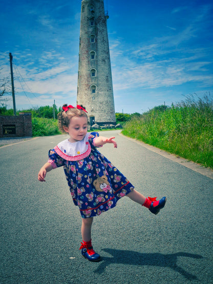 2-3 years. Vintage navy teddy dress with white bib and red gingham details. Mayfair Kids