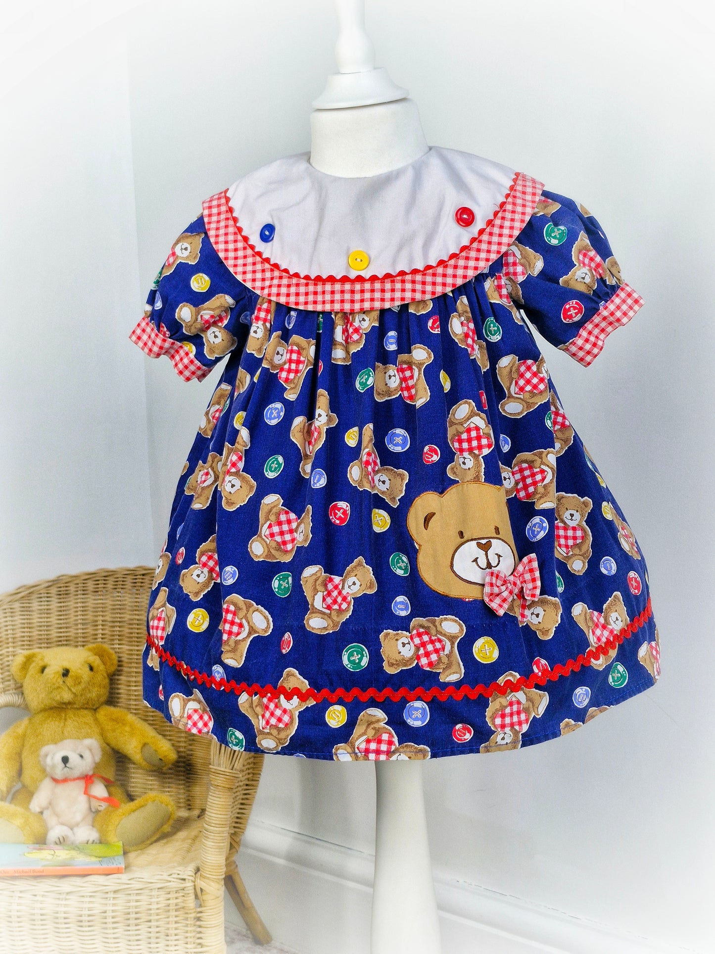 2-3 years. Vintage navy teddy dress with white bib and red gingham details. Mayfair Kids