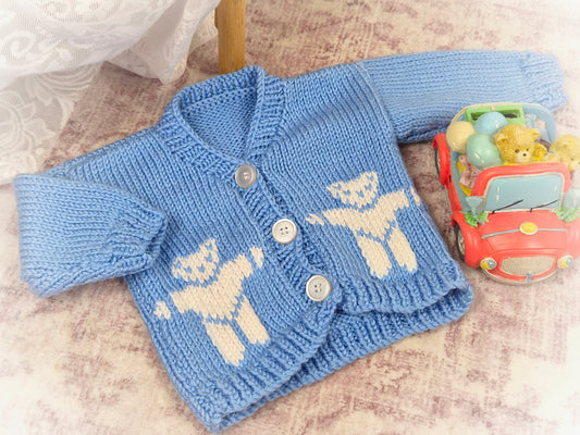 3-6 months. Blue and white knitted cardigan with teddy bears