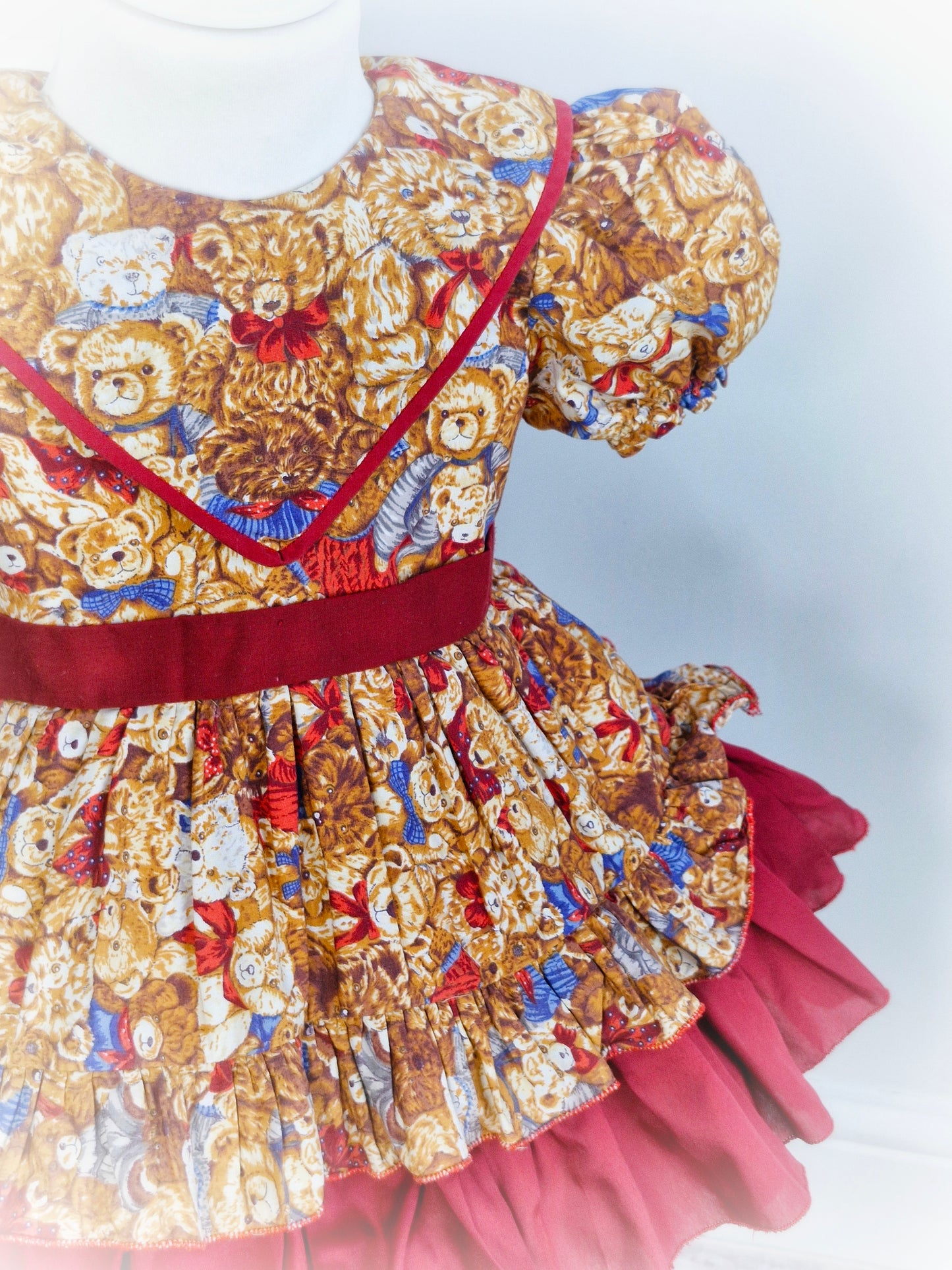 2 years. Handmade in Thailand. Brown bears with maroon finish. Layered skirts