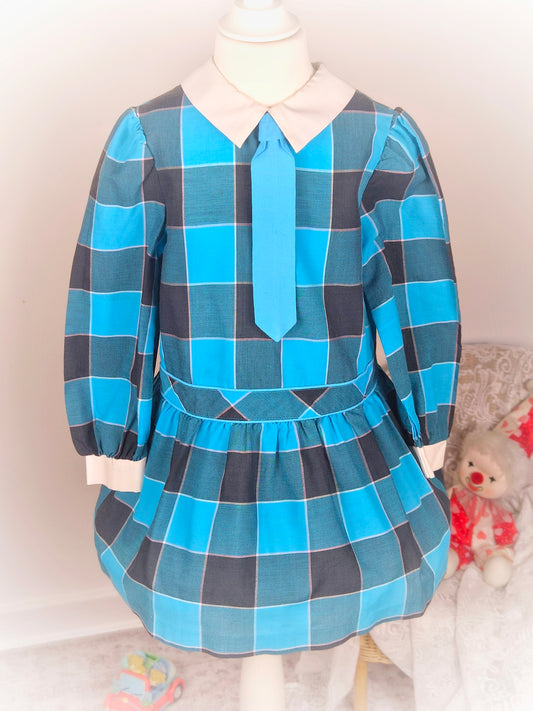 5 years. Teal and black vintage Roanna dress with white collar and "tie"