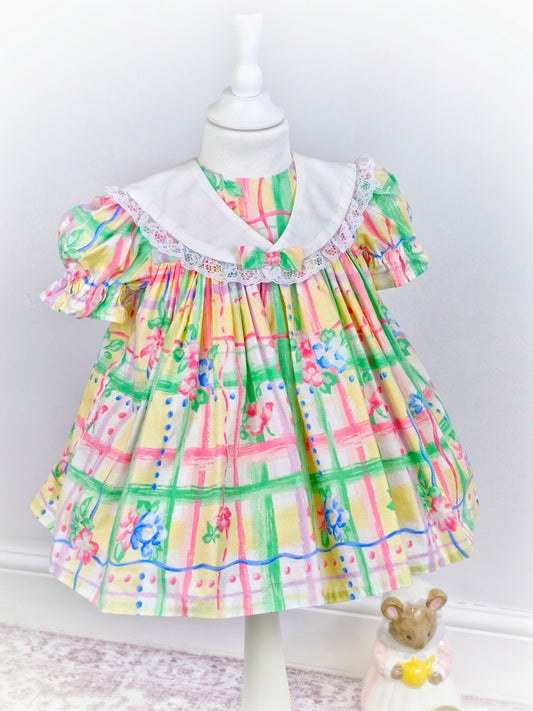 2 years. Handmade dress made with vintage fabric