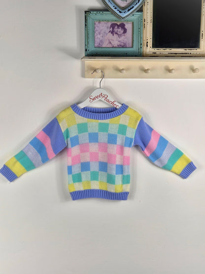 2 years. Mini Waves pastel checked and striped knit jumper