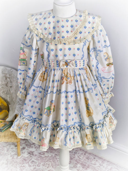 5 years. Vintage cream dress with sweet bears and bunnies and blue hearts and flowers