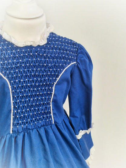 3 years. Navy and white high-neck smock dress