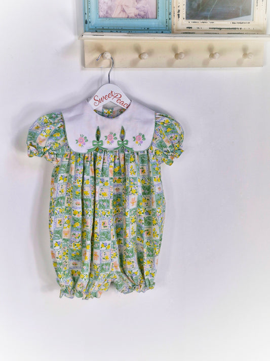 18-24 months. Vintage romper with white bib embroidered with bows and flowers, puff sleeves and flower and teddy bear print