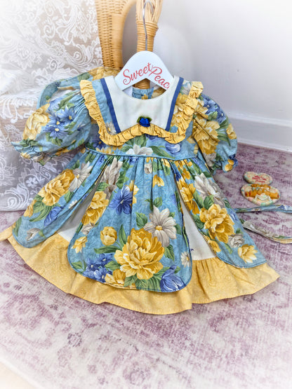 18-24 months. Yellow and blue floral vintage dress. Small fault*