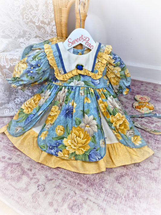 18-24 months. Yellow and blue floral vintage dress. Small fault*